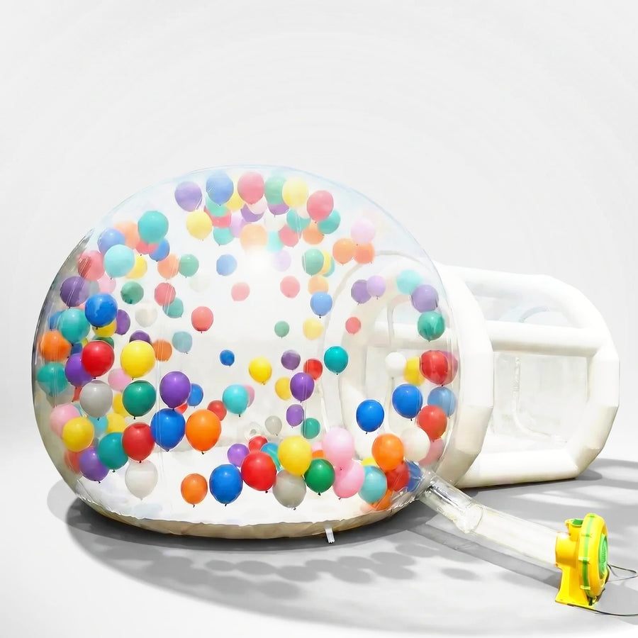 2.5m inflatable bubble house with balloons and blower on a light grey background