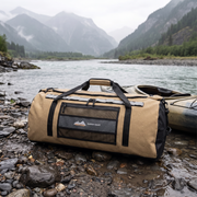 San Hima 110L waterproof duffel bag on a river bank