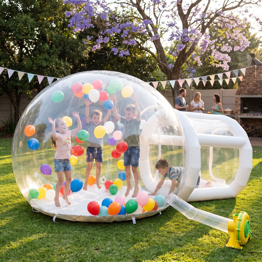 Kids playing with balloons inside the 2.5m bubble house at a backyard birthday party