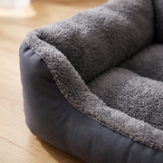 Close-up of the bolster rim and durable charcoal side fabric