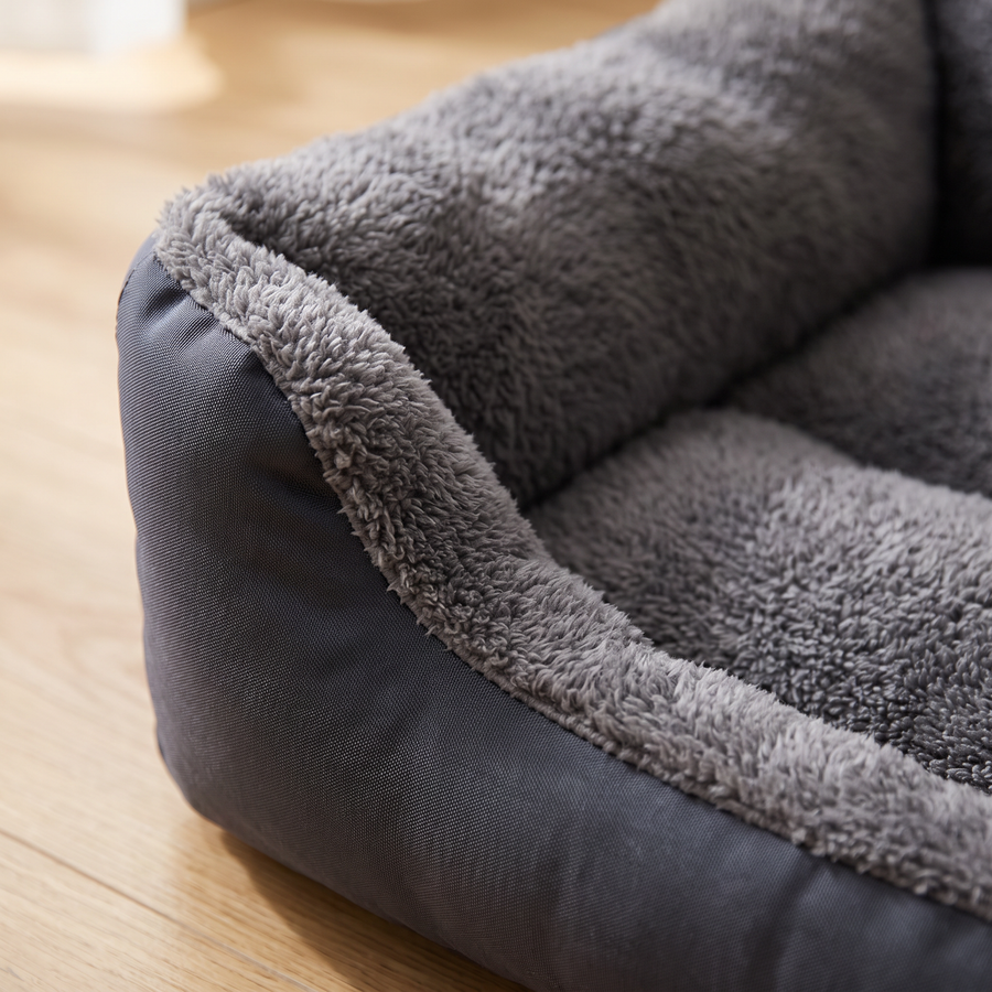 Close-up of the bolster rim and durable charcoal side fabric