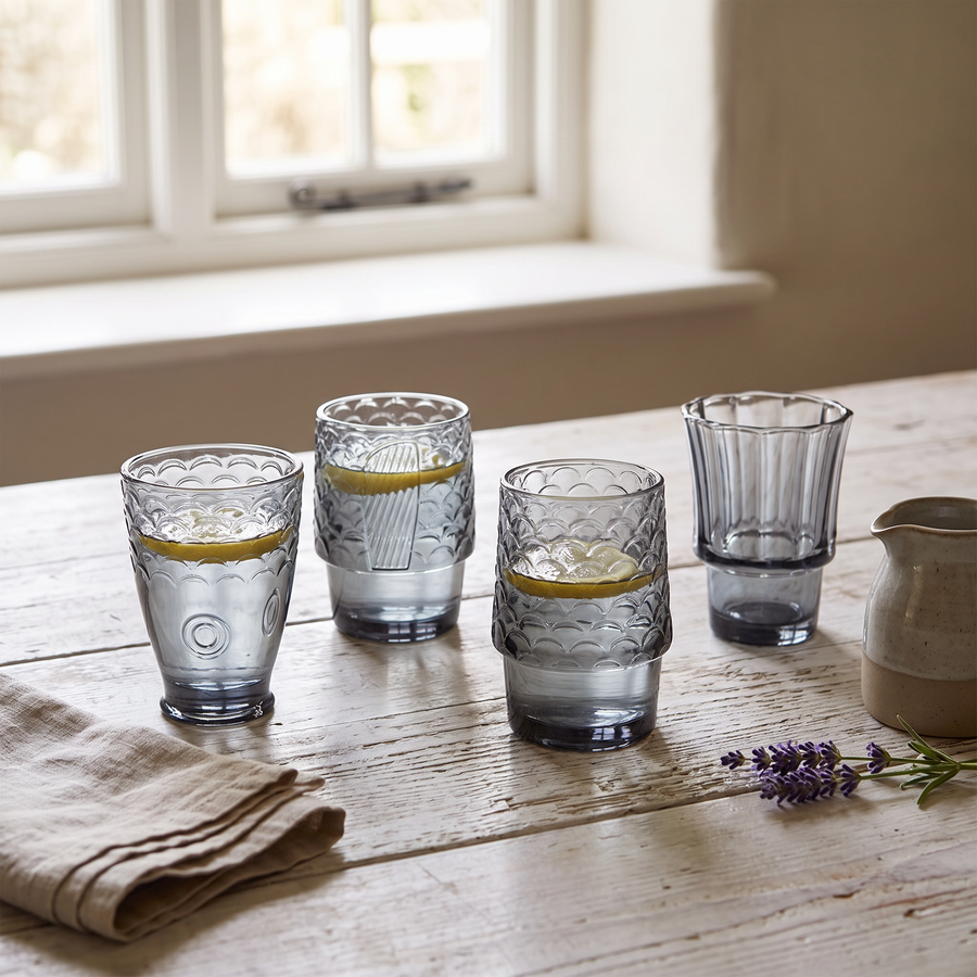 Four fish glasses on a cottage kitchen table