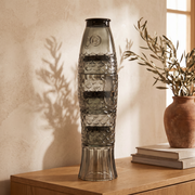 Stacked koi fish glasses on a sideboard