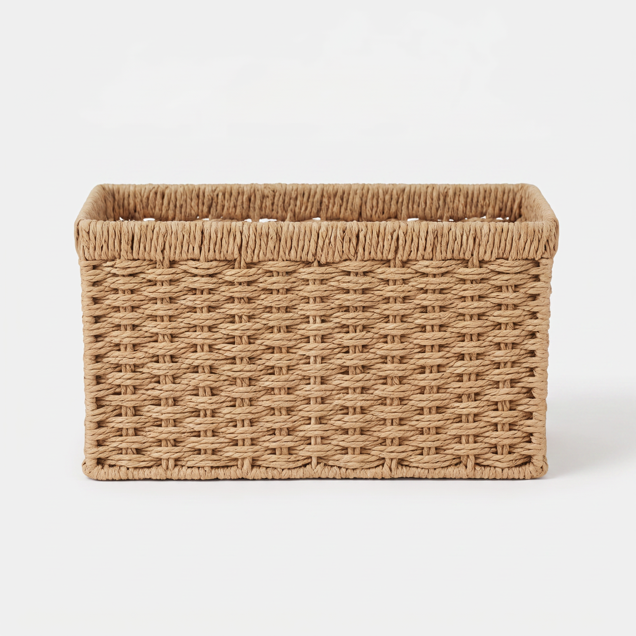Woven Wicker Storage Basket - front view on light grey background