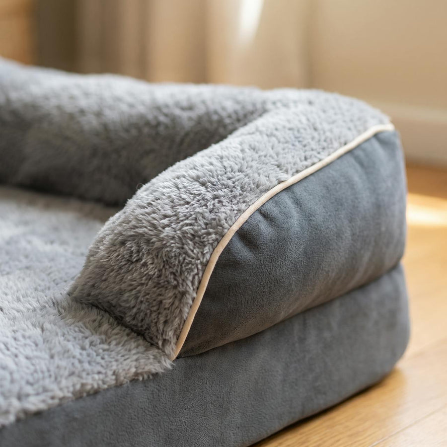 WuFF Orthopaedic Pet Bed close-up of the fleece bolster, suede corner wing and cream piping