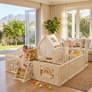 Little Rainbow Playpen in a Cape Town lounge with a toddler at the slide and Table Mountain outside