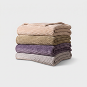 Faux Super Soft Fleece Blankets in all five colours stacked - studio product shot