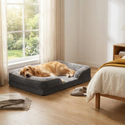 WuFF Orthopaedic Pet Bed in a bedroom corner with a golden retriever resting on the bolster