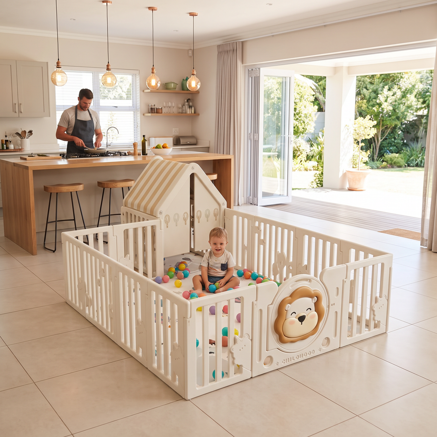 Toddler playing with balls in the Little Lion Playpen in an open-plan family home