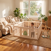 Little Avo Playpen in a warm family living room with a toddler standing inside