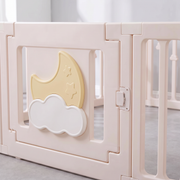 Close-up of the moon-and-cloud gate panel and external child-proof safety latch