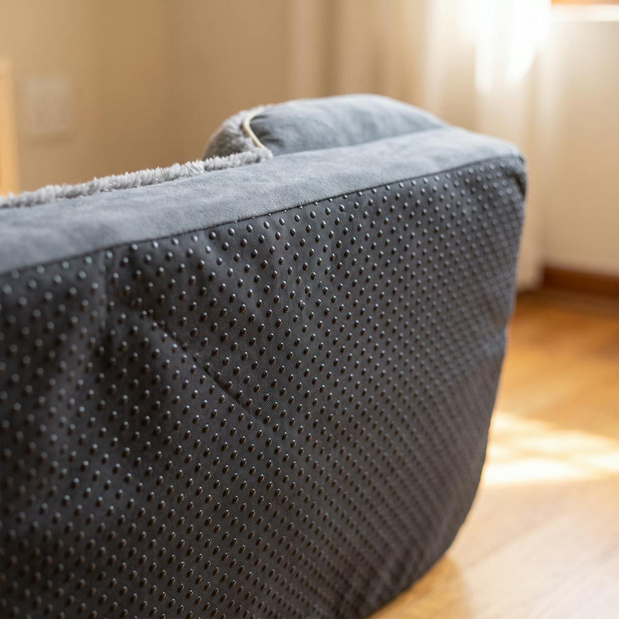 WuFF Orthopaedic Pet Bed underside showing the moulded non-slip grip dots