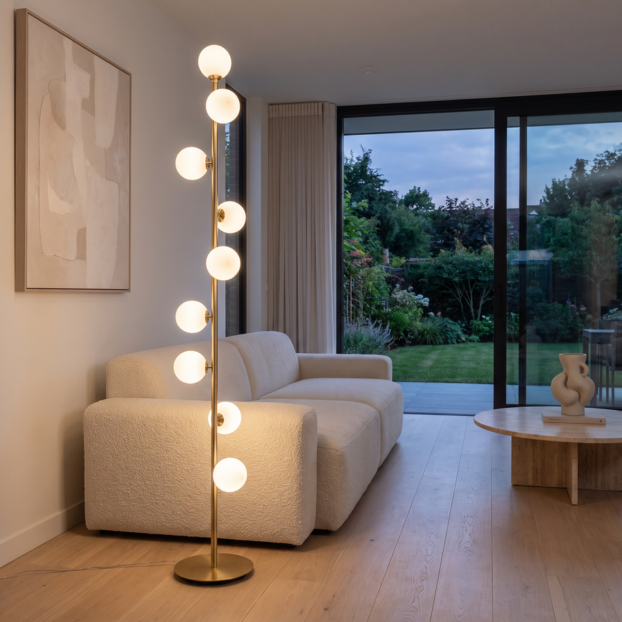 Lumiglow floor light beside a sofa in a modern living room