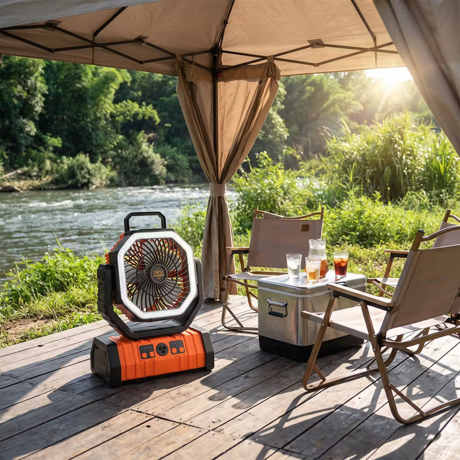 San Hima camping fan on a riverside deck