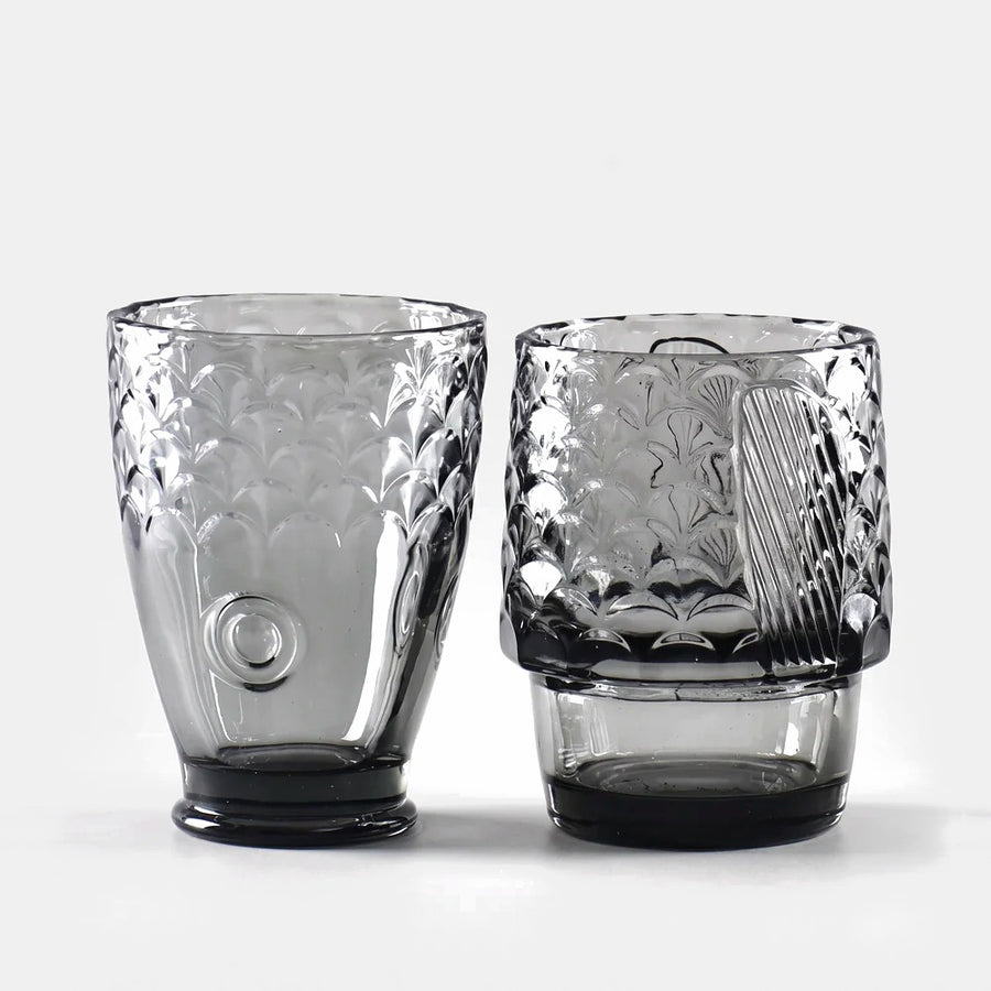 Close-up of the fish-scale detail on two fish stackable glasses