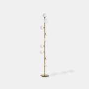 Lumiglow brass floor light with nine opal glass globes