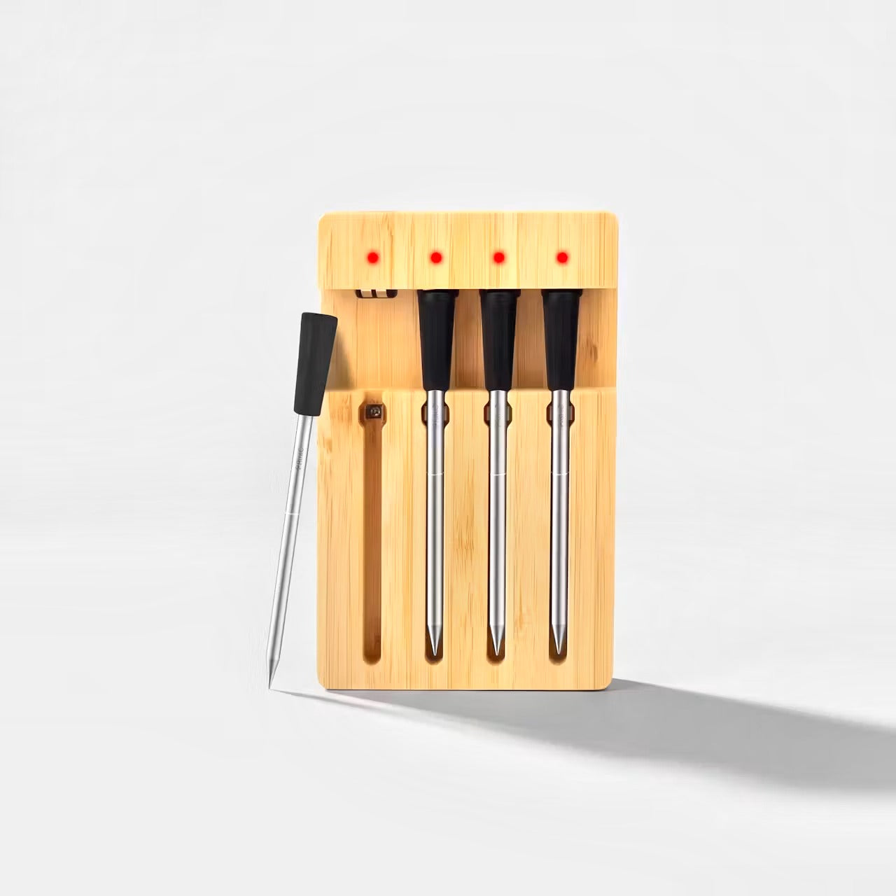 Primo T4 wireless meat thermometer with bamboo charging dock and four probes on studio grey