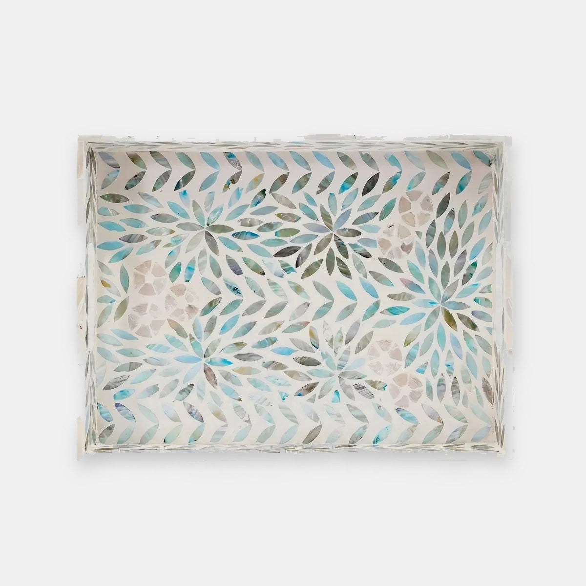 Tidal shell rectangular tray on a grey studio background