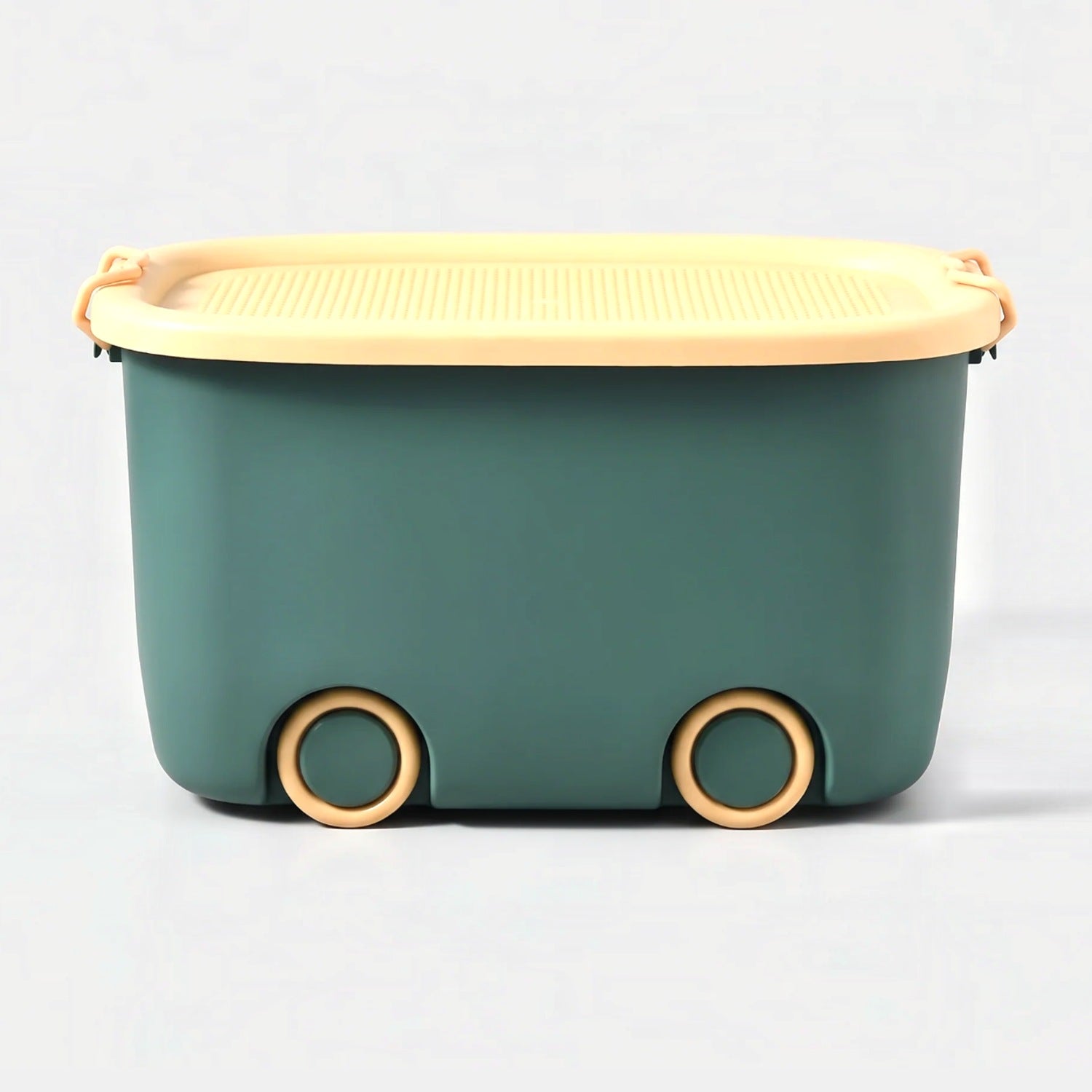 Play Time stackable storage box in green, front view on studio grey