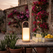Glimmer wood lantern on a Tuscan courtyard table