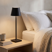 Luminee table lamp on a bedside table