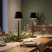 Two Luminee table lamps on a dinner party table